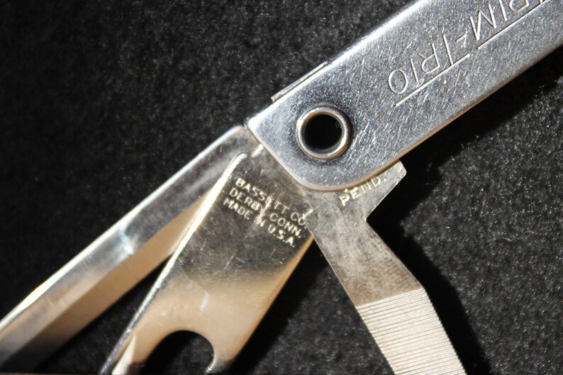 Vintage TrimTrio multitool/ folding knife from the Etsy