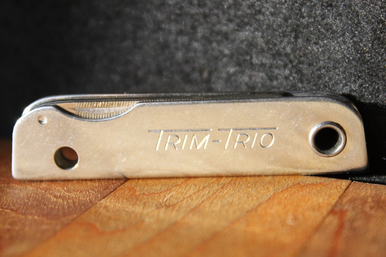 Vintage TrimTrio multitool/ folding knife from the Etsy