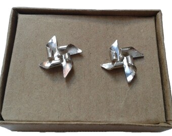 silver pin wheels ear studs