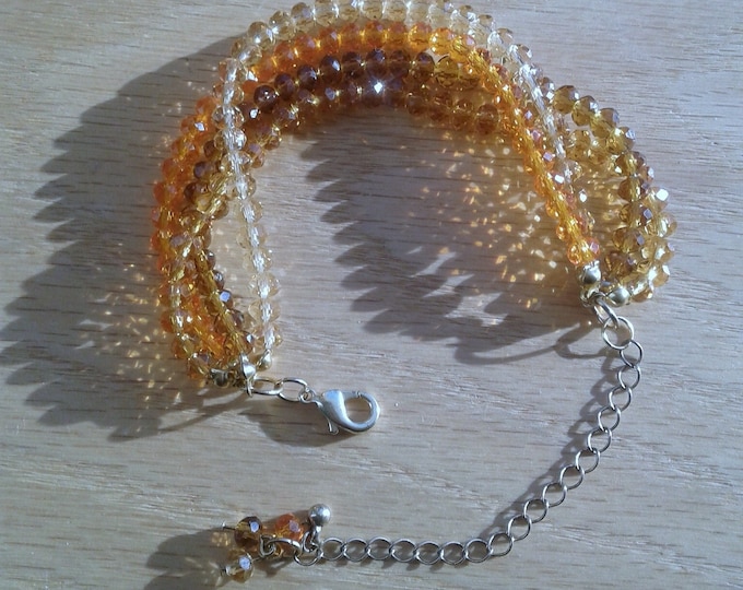 Orange beaded multistrand bracelet Adjustable