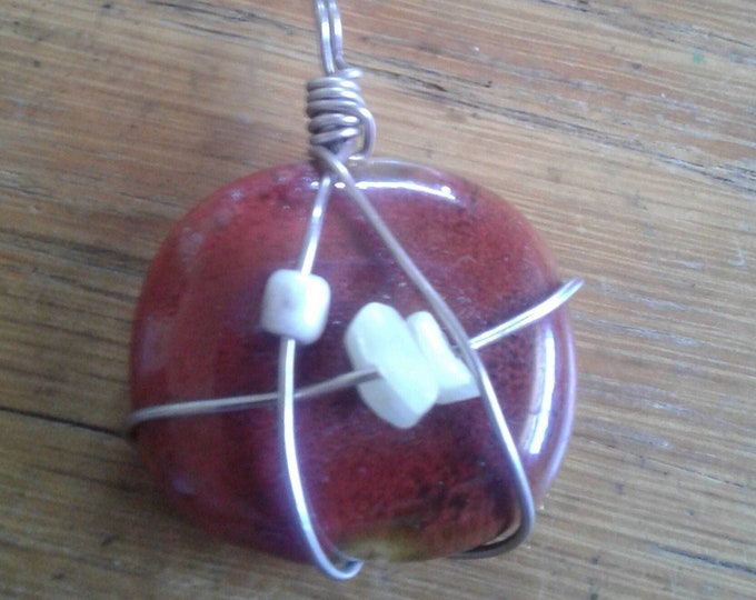 Wire wrapped rock w/ Jade chips pendant