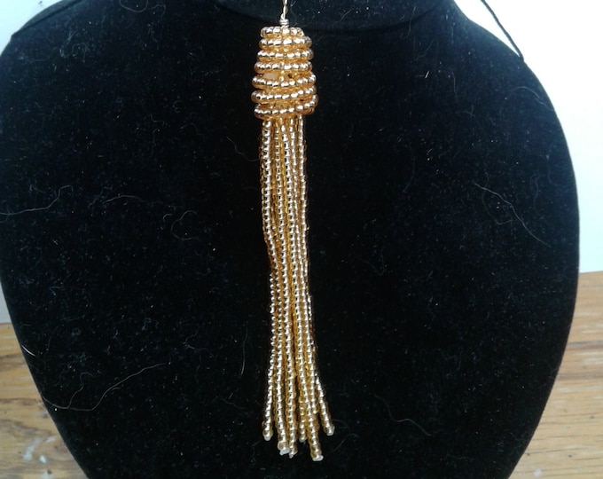 Gold seed bead tassle pendant