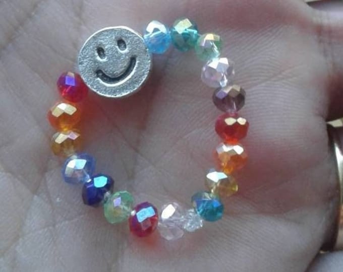 Stretchy smiley face fidget ring