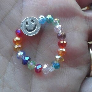 Stretchy smiley face fidget ring