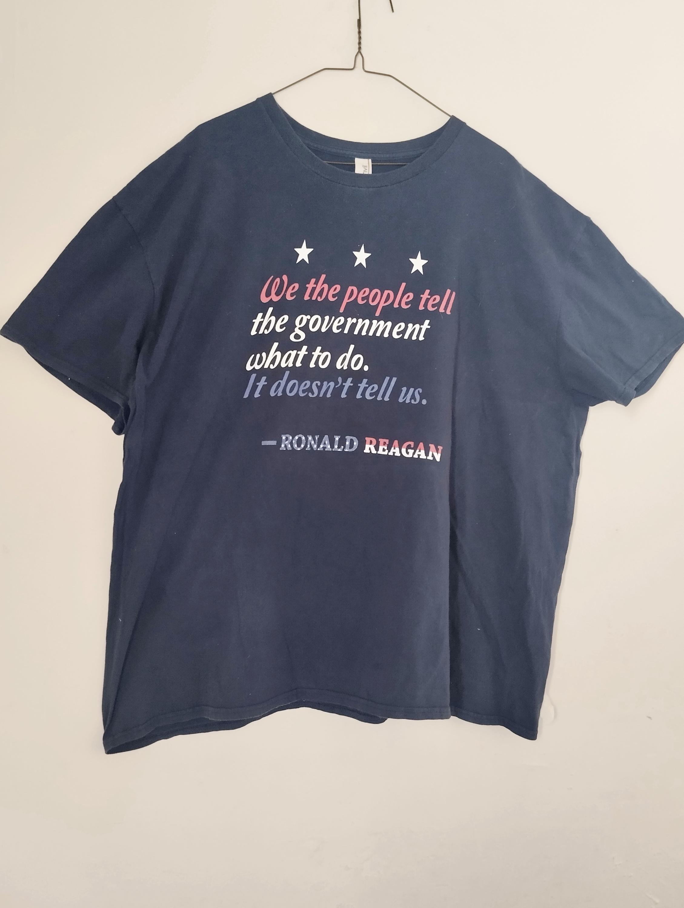 Ronald Reagan,blue t shirt with phrase.