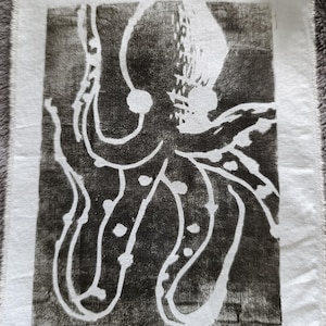 Estampa de linóleo com patch de polvo