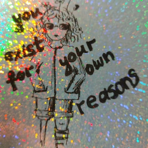Holographic “You Exist For Your Own Reasons” sticker