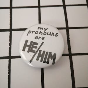 He/him pronoun pin badge button