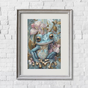 Puede incluir: Impresión artística enmarcada que presenta una ilustración caprichosa de una rana azul adornada con flores. La rana tiene ojos grandes y expresivos y está rodeada de elementos florales en tonos de rosa, verde y dorado. La obra de arte está sobre un fondo texturizado.
