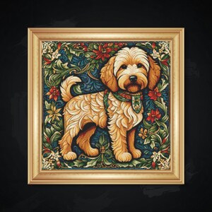 May include: A framed cross-stitch depicting a golden dog with a curly coat and a green collar. The background features blue and green foliage with red flowers. The frame is gold-coloured.