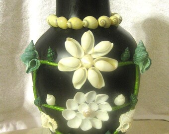 Vase, Decorated with Seashells, brimming with elegant style--with flowers included.