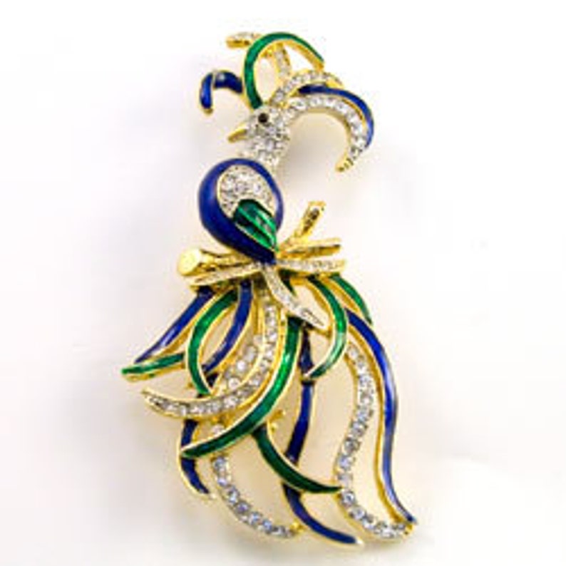 Lead and nickel free la Scala Triple 22kt gold plated with hand painted bluegreen enamel and handset crystals