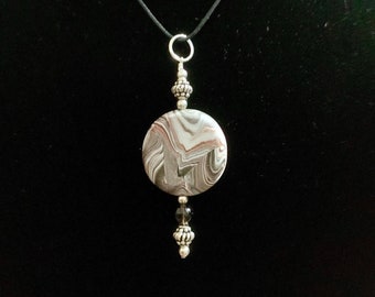 Polymer clay and sterling silver pendant