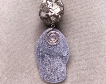 Beachstone and pyrite pendant