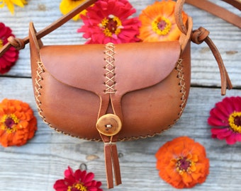 small leather bag. leather purse. artisan leather bag. wren in honey leather. wood button. under the tree.