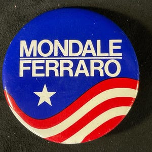 May include: A blue and red political campaign button with the text "Mondale Ferraro" and a white star on a blue background.