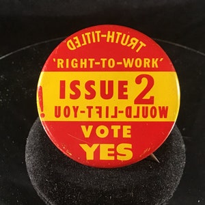 May include: Red and yellow button with the text 'Right-to-Work' Issue 2 Would You-Tell-D'UOW Vote Yes'.