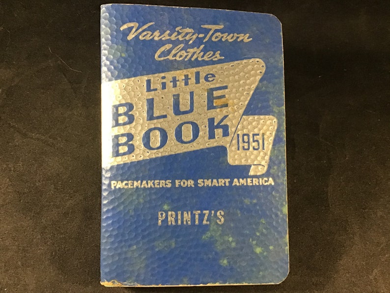 Softcover pocket style book Pacemakers for Smart America dress Vintage Little Blue Book 1951 by Varsity-Town Clothes and clothier Printz
