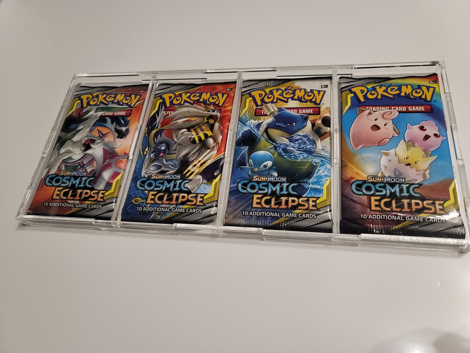 thumbnail image 2 of Pokemon Acrylic Display Case – Holds 4 Booster Packs, Storage And Protection 2 of 6