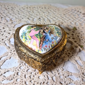 Vintage Heart-Shaped Porcelain Trinket Box Romantic Couple Illustration & Ornate Brass Trim