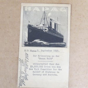 May include: Vintage black and white postcard featuring the S/S Hansa 3 ship, dated September 1922. The postcard includes text in English and German, promoting a fundraising event for the Relief of Distress in Germany and Austria.