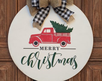 Accroche-porte joyeux Noël rustique - Camion rouge avec arbre et noeud écossais en buffle pour une décoration de vacances à la ferme