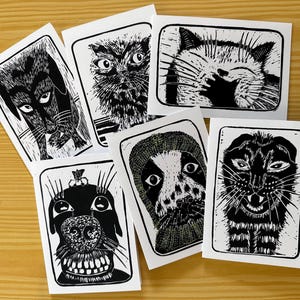 Six cartes imprimées à partir de linogravures