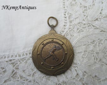 Vintage tennis medal