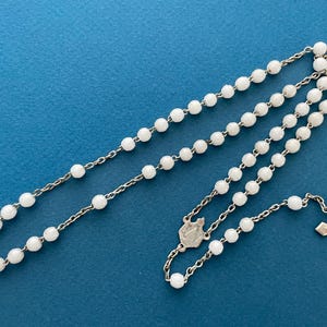 Antique rosary glass white