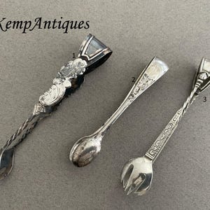 Antique sterling silver tongs cutlery