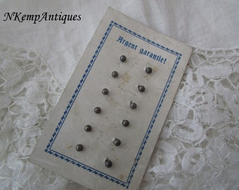 Antique silver earrings on original card nice for dolls