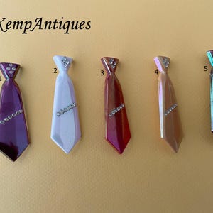 Old novelty tie brooch