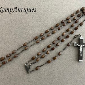 Old glass rosary brown religious