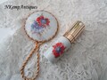 Porcelain mirror and perfume bottle product logo