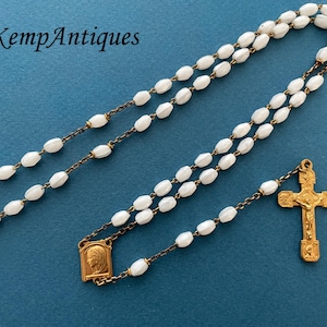 Old glass rosary white