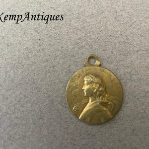 Antique joan of arc pendant