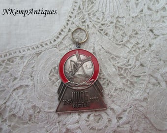 Windmill enamel medal