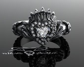 Claddagh ring with Celtic knot work weave in solid platinum with colorless ideal cut and heart diamonds. Victorian engagement promise ring