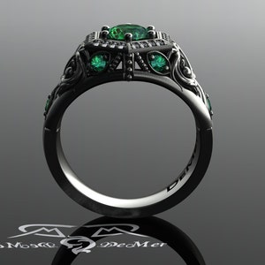 Unique emerald engagement ring in black gold. Art Deco halo and Victorian Gothic filigree scrollwork with ideal cut diamonds. Corvus Ring. image 5