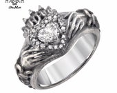 Claddagh ring with Celtic knot work weave in solid platinum with colorless ideal cut and heart diamonds. Victorian engagement promise ring