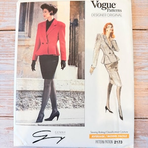 May include: A vintage Vogue Patterns sewing pattern showing a red blazer and skirt outfit. The pattern includes a drawing of a woman in a gray suit. The text on the pattern reads "DESIGNER ORIGINAL" and "PATTERN/PATRON 2173".
