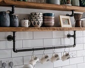 Steel pipe shelf brackets with hanging rail