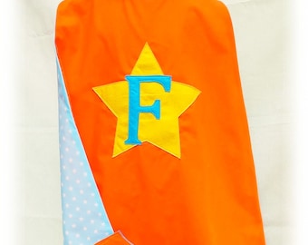 Personalised superhero cape, mask and cuffs set, orange and turquoise with stars