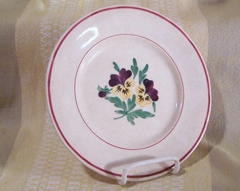 20's Alumina Aluminia plate with hand painted pansy on tan clay body