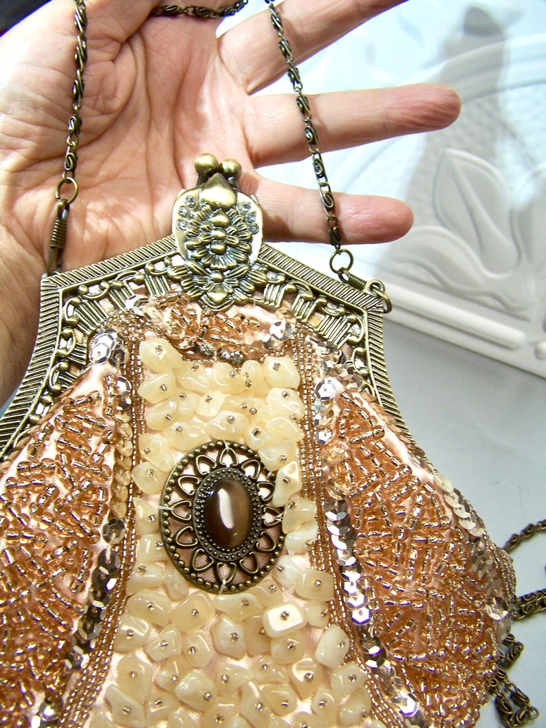 GORGEOUS bag, Individual quartz stones, sequins and beads totally covering this bag, bottom is a satin base...beautiful with a long handle option in fine chain and clips. Clean and perfect!