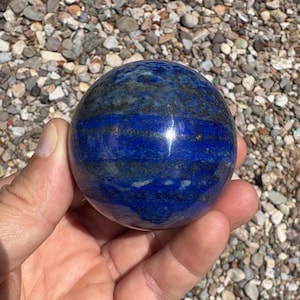 58mm Lapis Lazuli Sphere. Comes with an acrylic stand