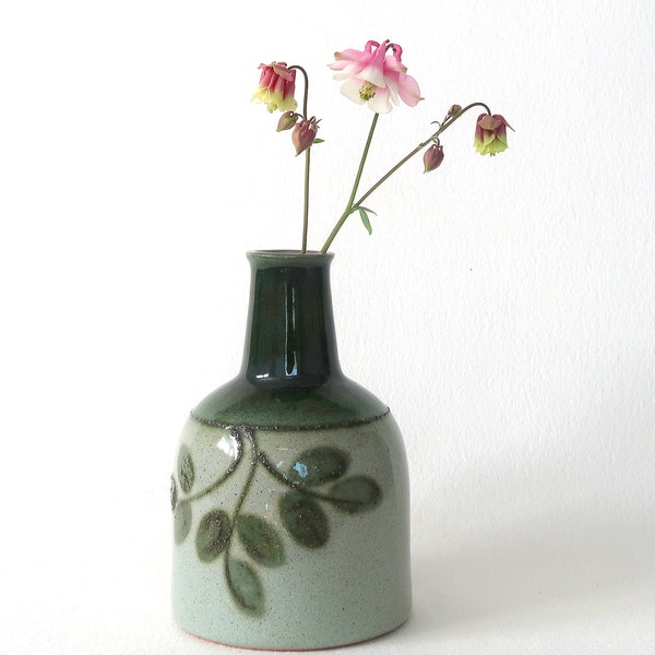 Vintage ceramic bottle by  Strehla Keramik, bell shaped  with green leaf decoration.