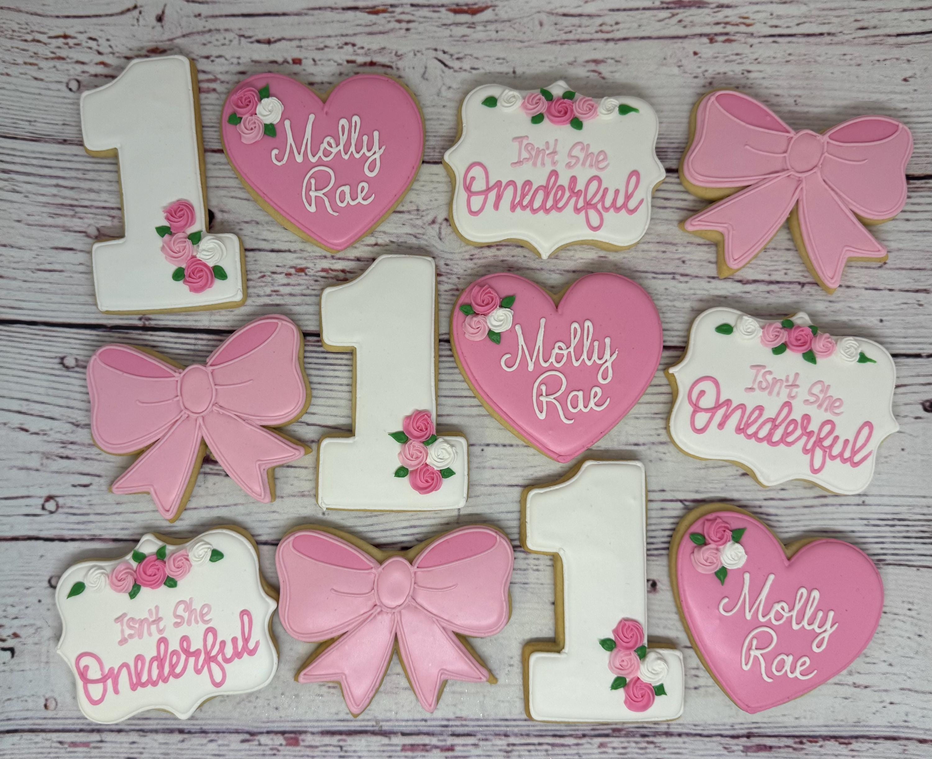 Recuerdos únicos para la primera fiesta de cumpleaños, los mejores recuerdos para el primer cumpleaños, recuerdos para fiestas con temática de amor, galletas con lazo y corazón, Isn't She Onederful