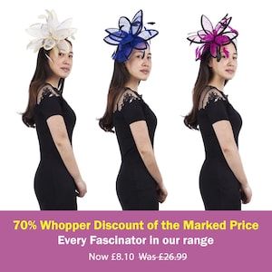 May include: Three women wearing different colored fascinators. The fascinators are in cream, blue, and pink. Each woman is wearing a black dress. The image includes text that says "70% Whopper Discount of the Marked Price Every Fascinator in our range".