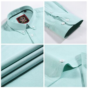 May include: A light green button-down shirt with a classic collar and buttoned cuffs. The shirt features a chest pocket and a label with a crest design. The fabric appears to be a soft, woven material.